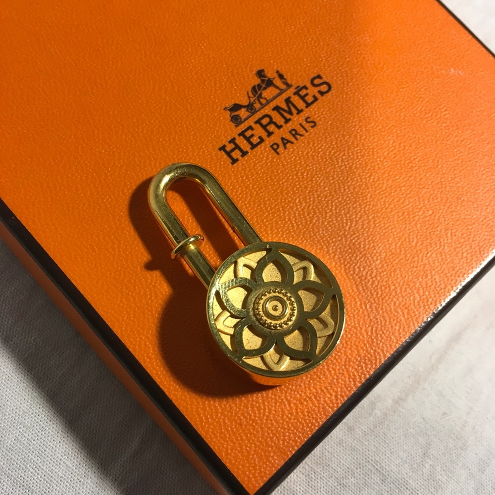 Hermes gold Lotus pendant